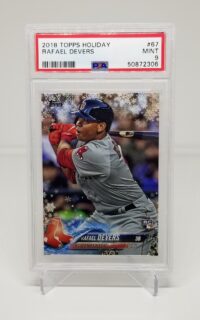a Rafael Devers 2018 Topps Holiday #67 PSA 9 with a red sox player on it.