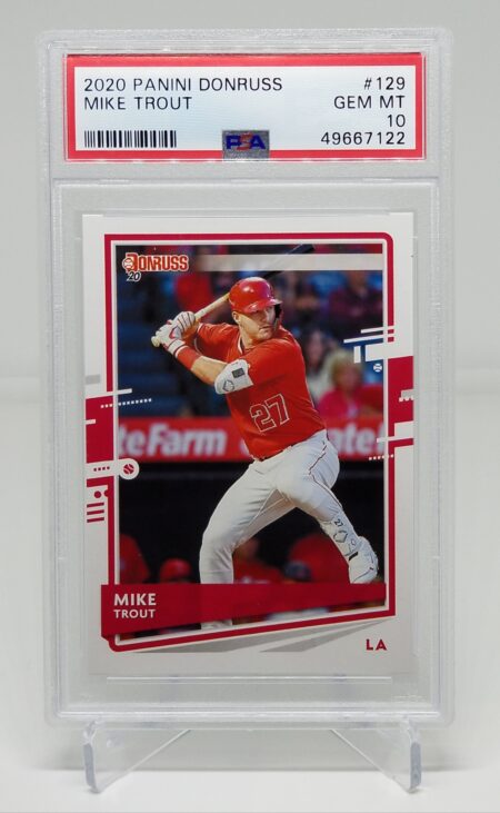 a 2020 Panini Donruss #129 Mike Trout PSA 10 card with a picture of mike donohue.