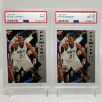 two 1995-96 Upper Deck SP Kevin Garnett #159 PSA 10 & PSA 9 Lot (2) basketball cards in a display case.