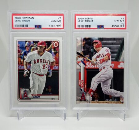 Two 2020 Topps #1 PSA 10 & 2020 Bowman #1 PSA 10 Mike Trout Lots (2) are displayed in a display case.