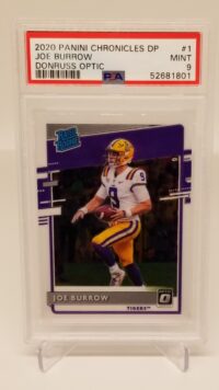 a 2020 Panini Chronicles Draft Optic Joe Burrow #1 PSA 9 card with a picture of a football player.