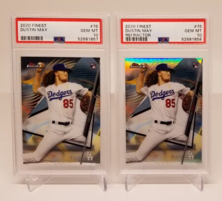 two 2020 Topps Finest #76 Dustin May Base & Refractor Lot (2) PSA 10 baseball cards in a display case.