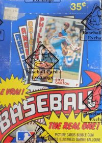 Assorted 1984 O-Pee-Chee baseball cards featuring players from various teams displayed on a colorful advertising board for a baseball card exchange.