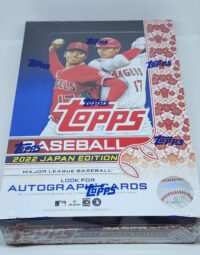 A box of 2022 Topps Japan Edition - By The Pack Personal Break featuring two players in action on the cover, with red and white design accents.