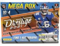 A 2023 Panini Prizm Blaster Box featuring a player in a blue number 26 jersey on the cover.