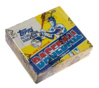 Vintage 1983 Topps Cello Pack With PSA Bonus featuring colorful graphics, priced at 49 cents, isolated on a white background.