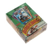 A sealed box of 1990 O-Pee-Chee baseball cards featuring an image of a player on the cover.