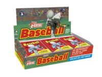 A 2024 Topps Heritage - Hobby Box featuring a player swinging a bat, with text promoting an autograph or relic card in every box.